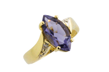 Iolite and diamond ring in 14 carat gold