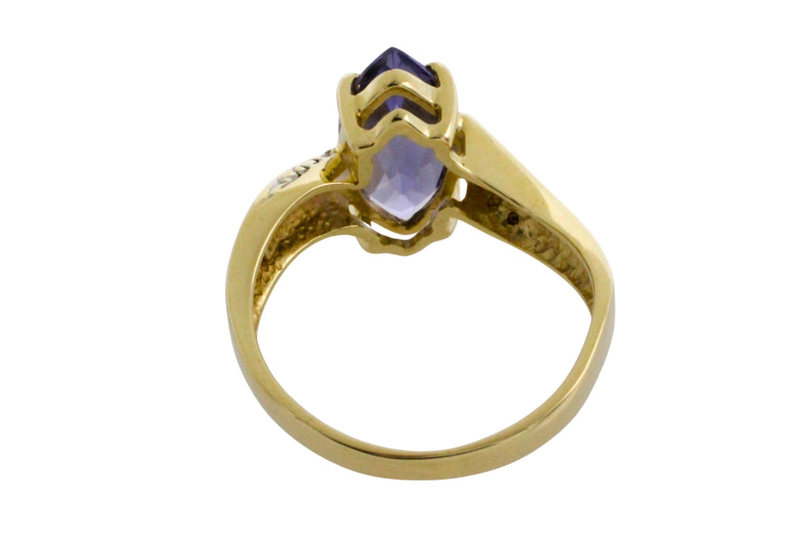 Iolite and diamond ring in 14 carat gold