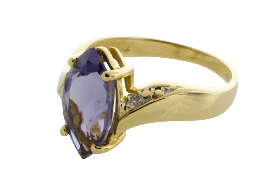 Iolite and diamond ring in 14 carat gold
