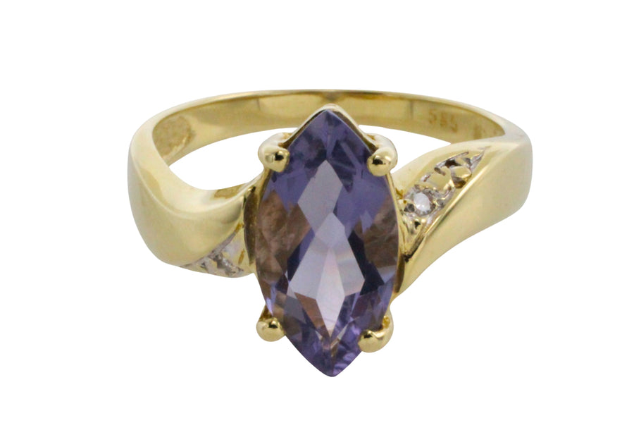Iolite and diamond ring in 14 carat gold