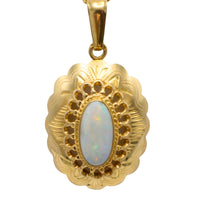 White opal pendant in 14 carat gold