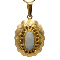 White opal pendant in 14 carat gold