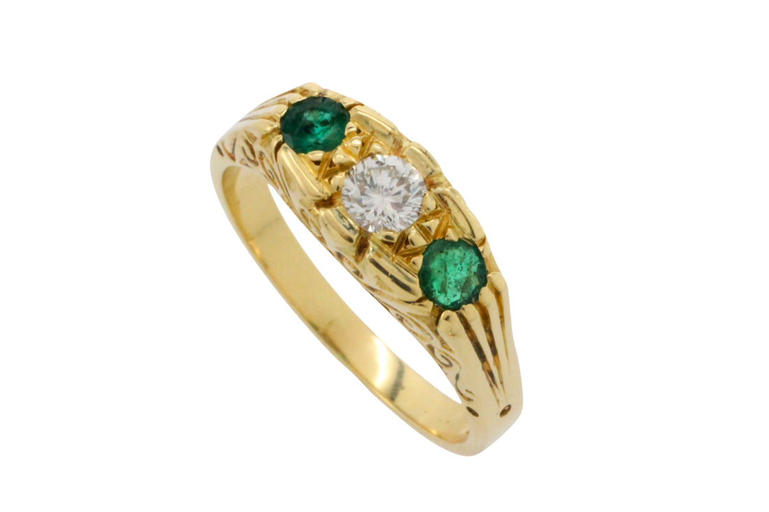 Vintage emerald and diamond ring in 18 carat gold