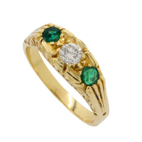 Vintage emerald and diamond ring in 18 carat gold