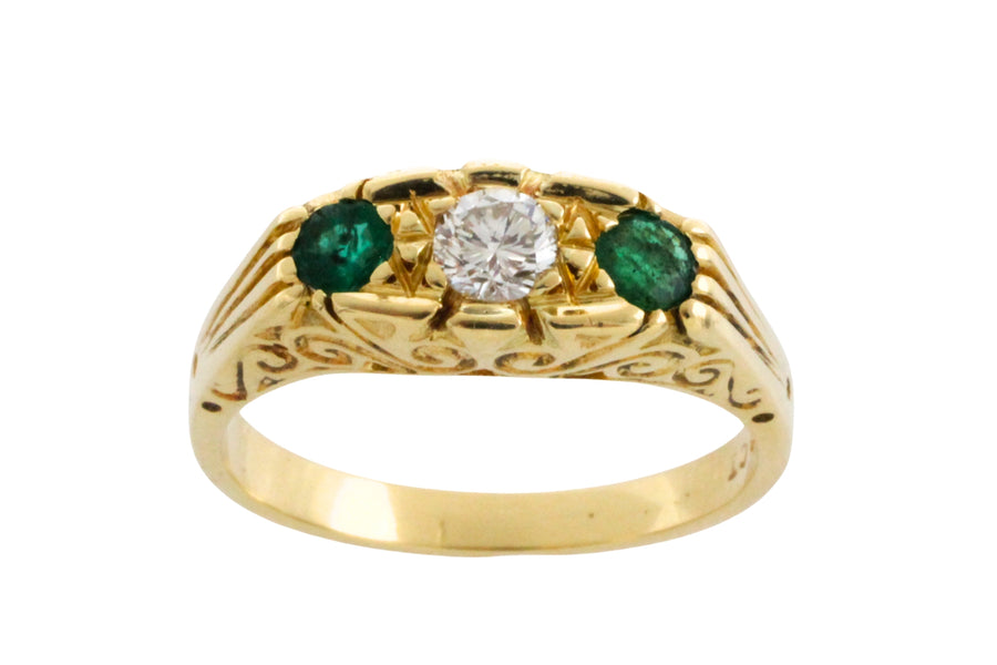 Vintage emerald and diamond ring in 18 carat gold
