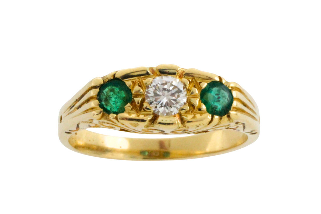 Vintage emerald and diamond ring in 18 carat gold