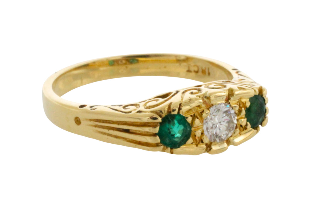 Vintage emerald and diamond ring in 18 carat gold