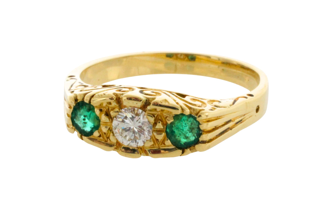 Vintage emerald and diamond ring in 18 carat gold