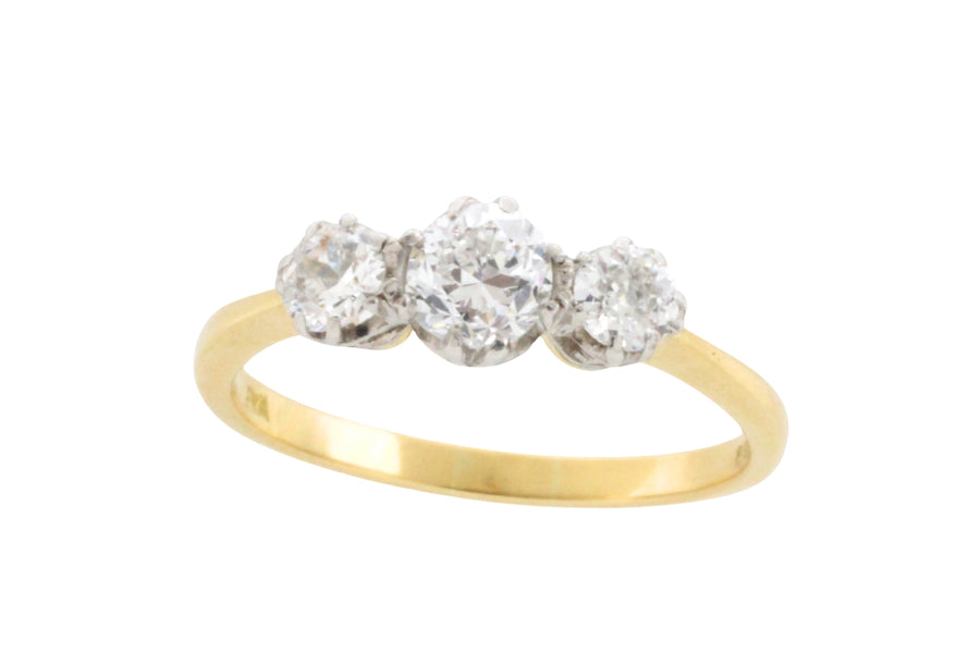 Three stone diamond ring in 18 carat gold