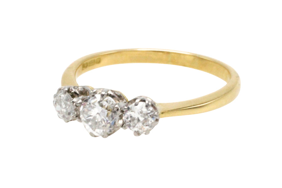 Three stone diamond ring in 18 carat gold