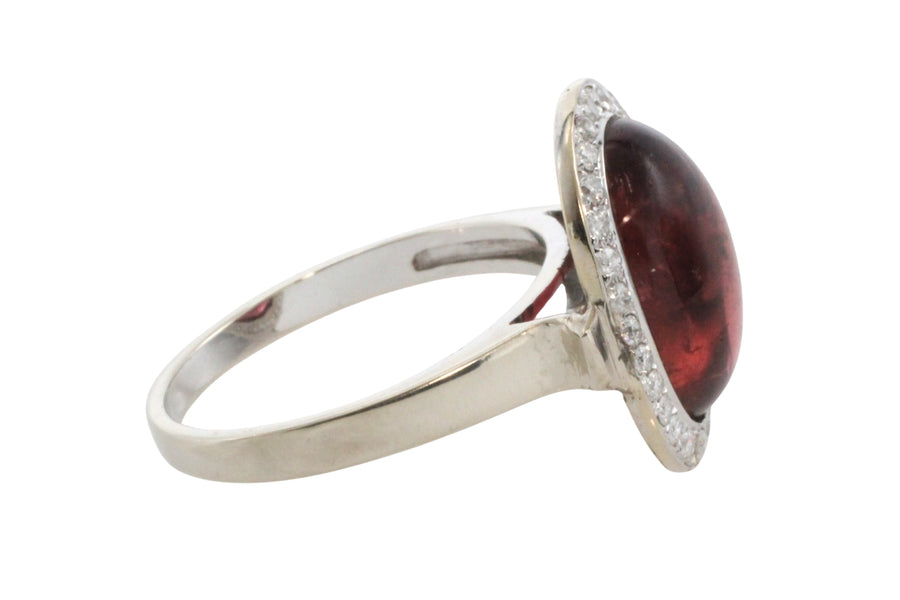 Cabochon pink tourmaline and diamond ring in white gold
