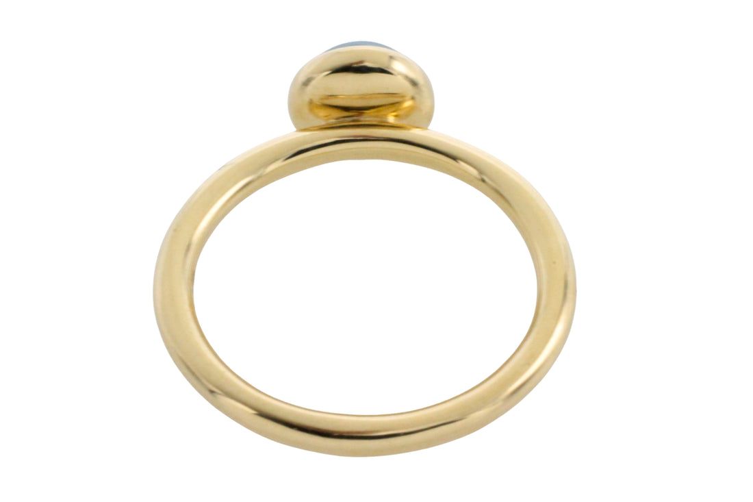 Cabochon blue topaz ring in 14 carat gold