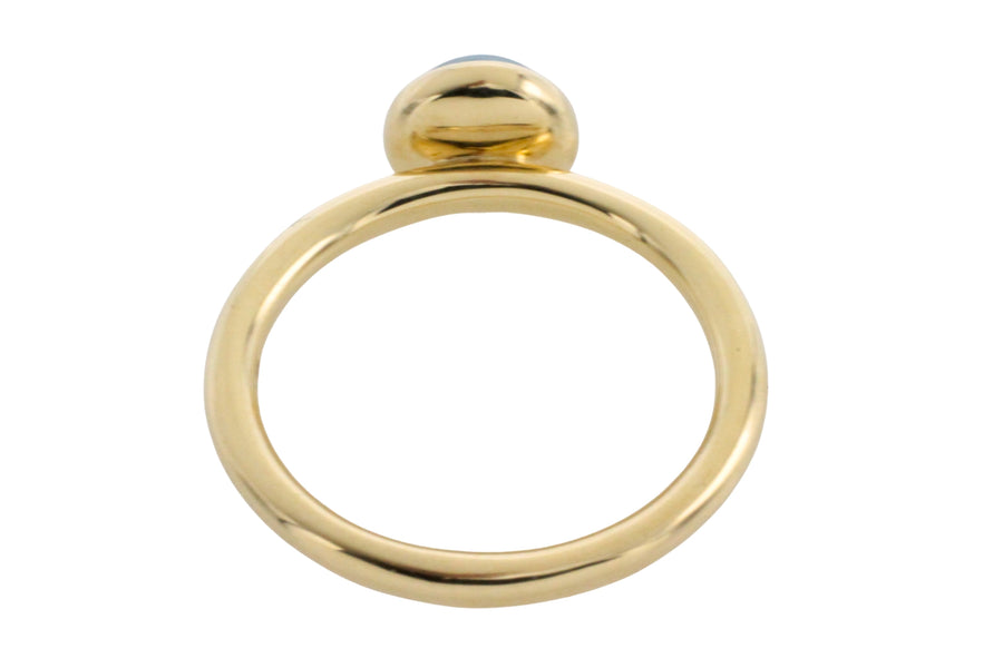 Cabochon blue topaz ring in 14 carat gold