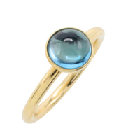 Cabochon blue topaz ring in 14 carat gold