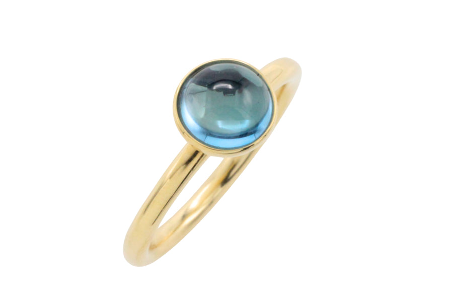 Cabochon blue topaz ring in 14 carat gold