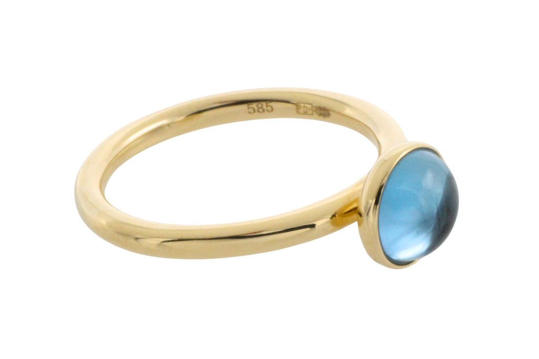 Cabochon blue topaz ring in 14 carat gold