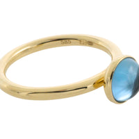 Cabochon blue topaz ring in 14 carat gold