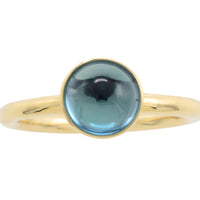 Cabochon blue topaz ring in 14 carat gold