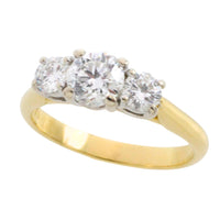 Three stone brilliant cut diamond ring