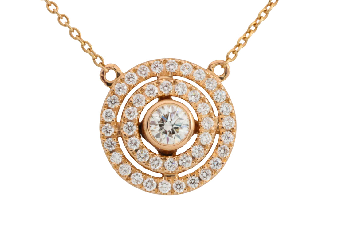 Diamond pendant and chain in 18 carat gold