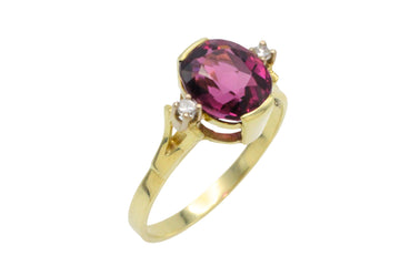 Vintage garnet and diamond ring in 14 carat gold