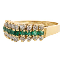 Emerld and diamond ring in 14 carat gold