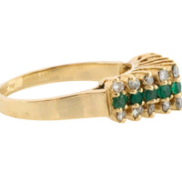 Emerld and diamond ring in 14 carat gold