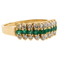 Emerld and diamond ring in 14 carat gold