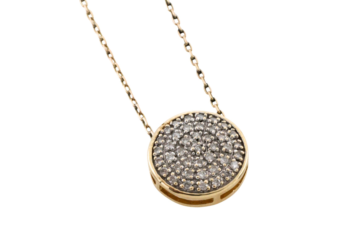 Diamond pendant in yellow and white gold