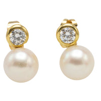 14 carat gold pearl and diamond studs