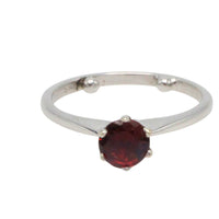 Garnet solitaire ring in white gold