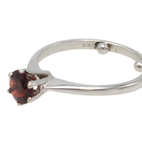 Garnet solitaire ring in white gold