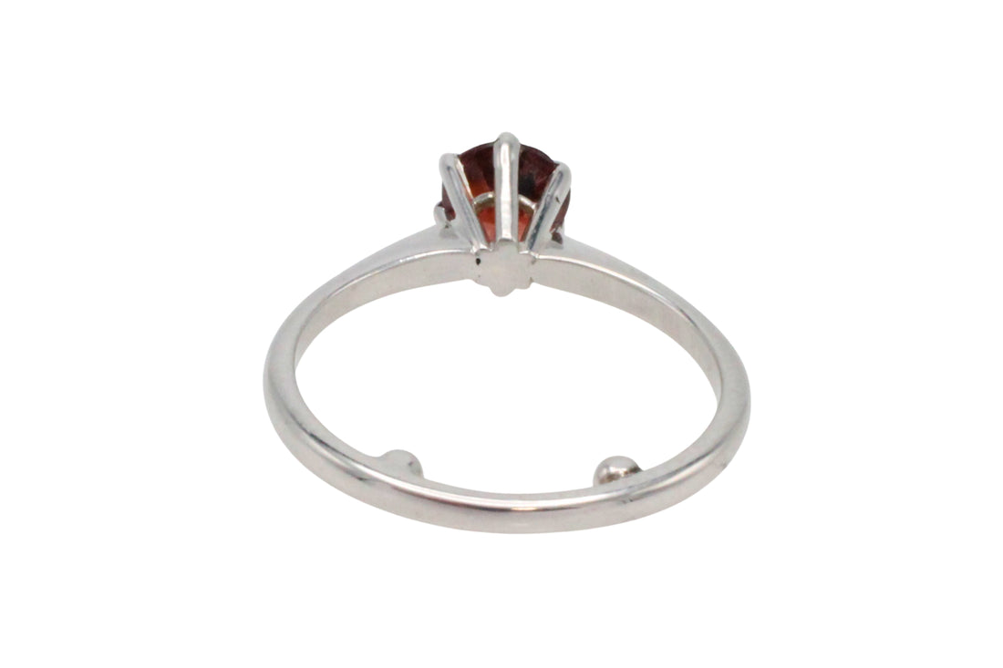 Garnet solitaire ring in white gold
