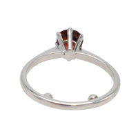 Garnet solitaire ring in white gold