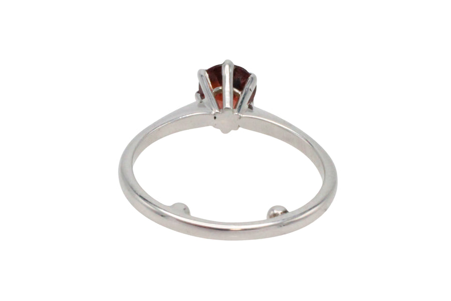 Garnet solitaire ring in white gold