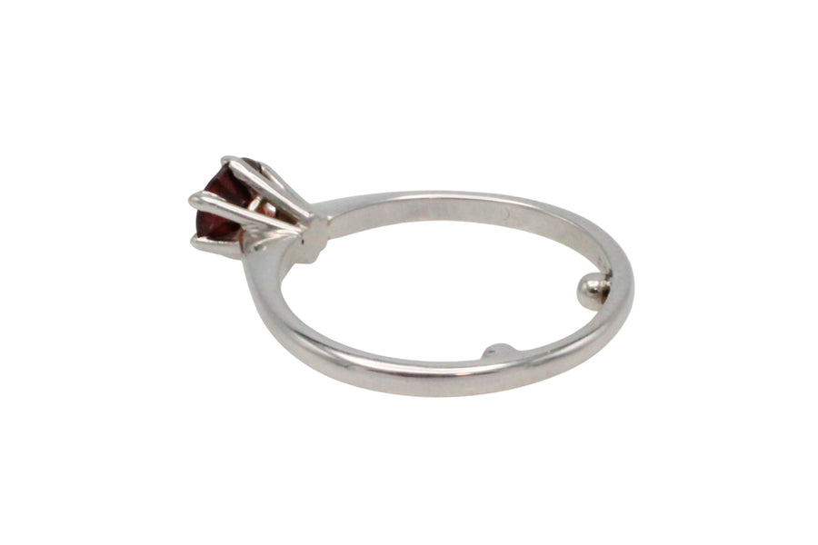 Garnet solitaire ring in white gold