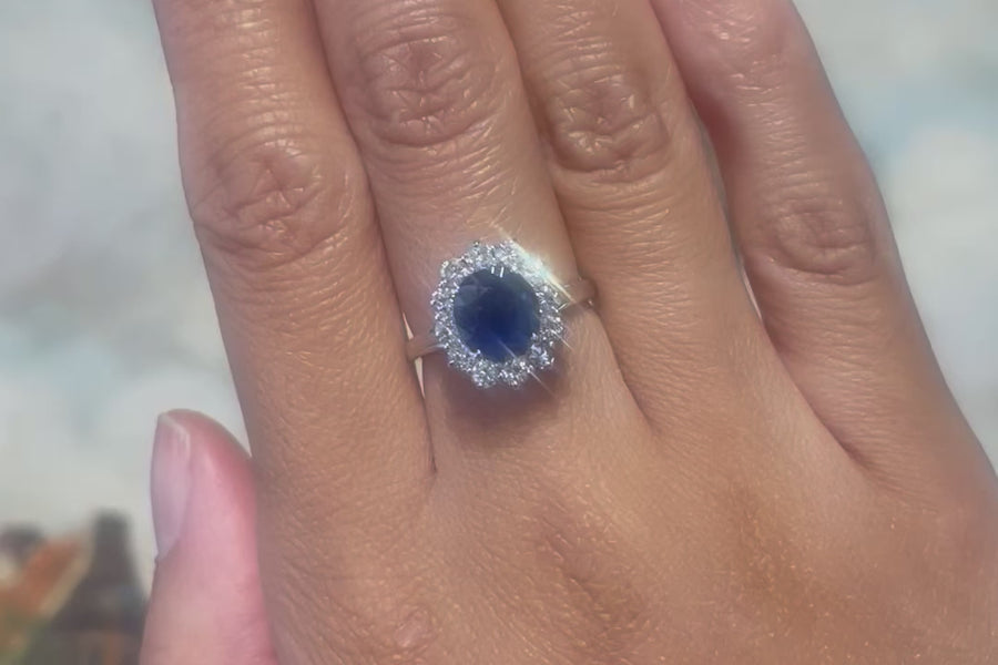 Sapphire and diamond cluster ring in white gold