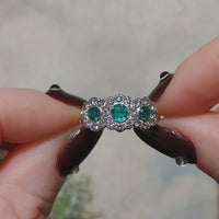 Vintage emerald and diamond triple cluster ring