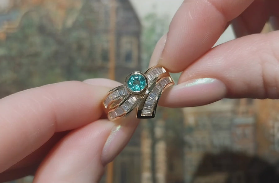 Baguette diamond and emerald ring