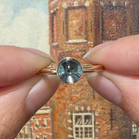 Cabochon blue topaz ring in 14 carat gold