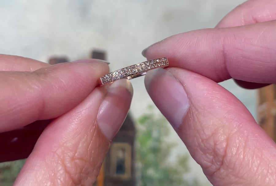 Rose gold half eternity band with diamonds