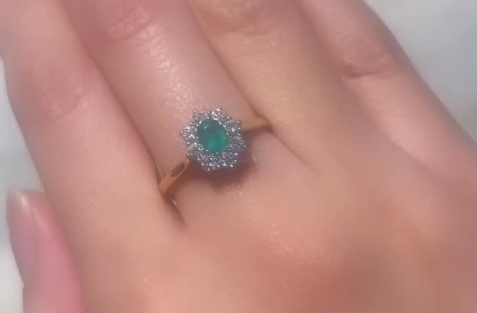 Emerald and diamond cluster ring in 18 carat gold