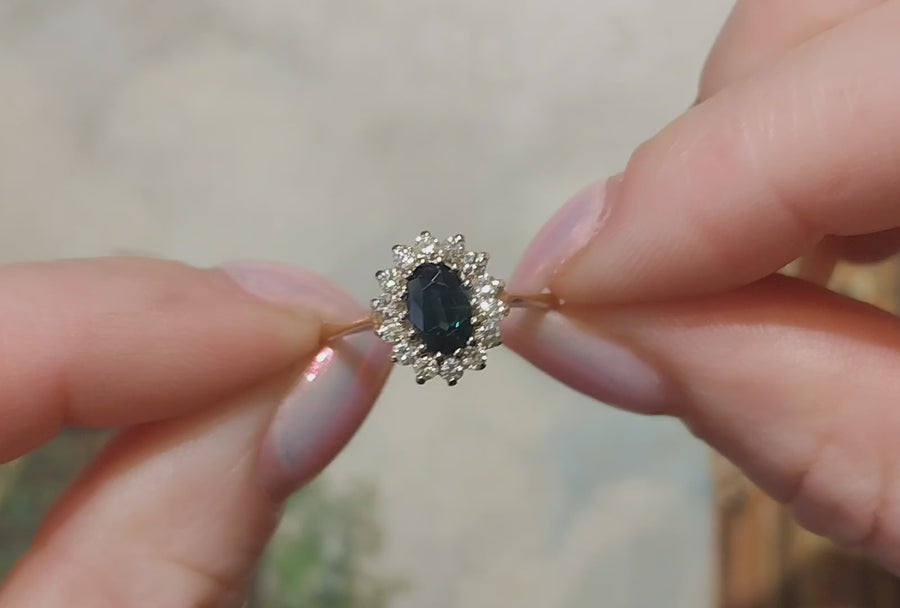 Sapphire and diamond cluster ring in 14 carat gold