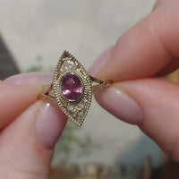 Pink sapphire marquise ring with diamonds