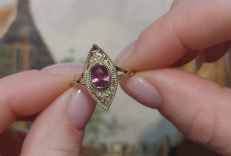 Pink sapphire marquise ring with diamonds