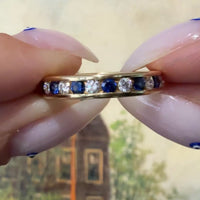 Sapphire and diamond eternity band in 18 carat gold