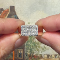 14 karaat gouden ring met pave gezetten diamanten