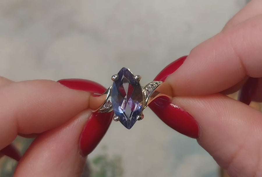 Iolite and diamond ring in 14 carat gold