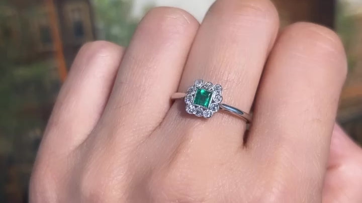 Art Deco platinum ring with emerald and diamonds