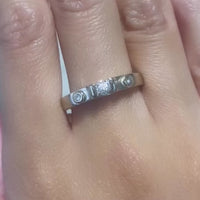 Yellow and white gold three stone diamond ring